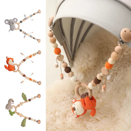 Chaine suspendue de poussette pour bébé. Jouet d'éveil. Adaptable et facile à accrocher