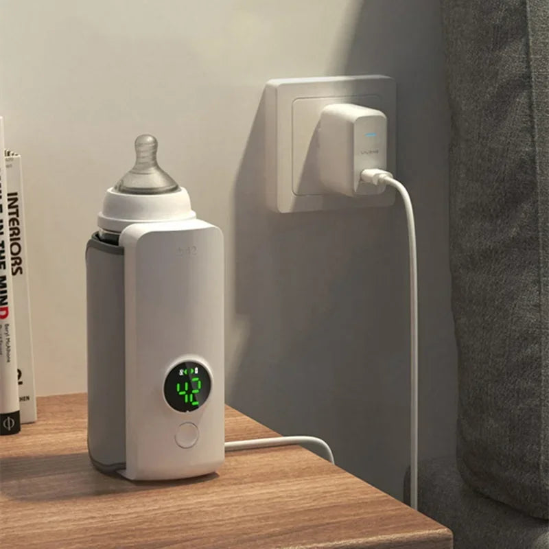 Chauffe biberon sur secteur portable,  pratique pour vos voyages. Compatible avec presque tous les biberons
