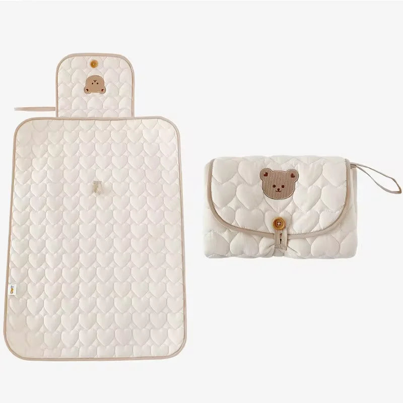 Matelas pliable pour changer bébé en déplacement