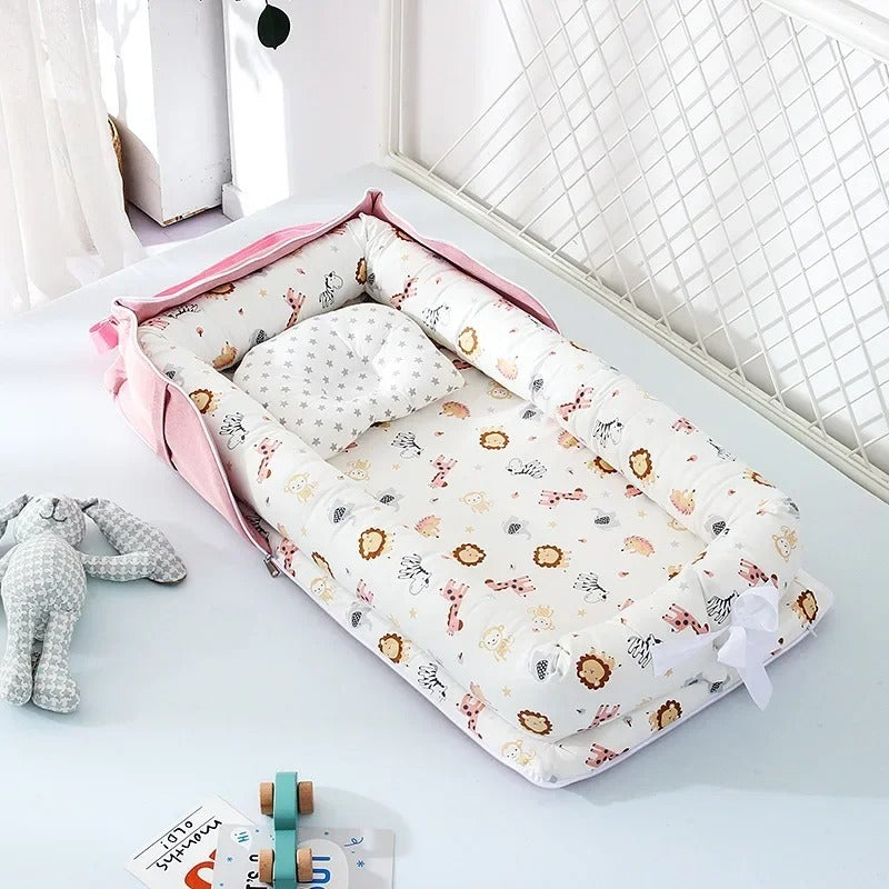 Nid bébé de voyage pliant pour un transport facile sur le thÚme des lions de couleur rose
