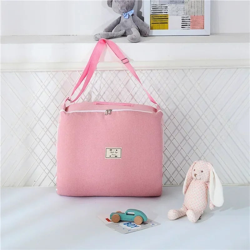 Nid bébé de voyage rangé dans son sac de transport