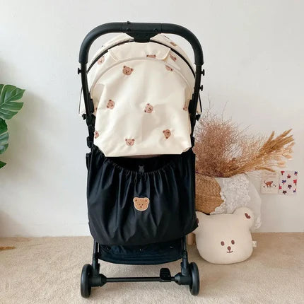 Pochette de rangement suspendue pour poussette. Idéale pour mettre les jouets de nos enfant ou tous les essentiel de bébé couleur noir