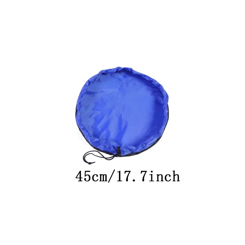Sac à jouets de plus petite capacité  mais tout aussi pliable et pratique. Tapis de jeu 2 en 1 de couleur bleu foncé