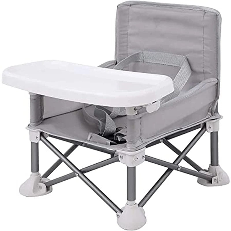 Rehausseur pliant et transportable. Une chaise pliable idéale pour les repas de bébé. Très pratique pour l'intérieur, l'extérieur et les voyages. Couleur gris