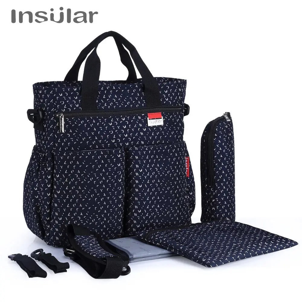 Sac à langer Mama Bag au style épuré, pensé pour les femmes modernes, modÚle bleu marine