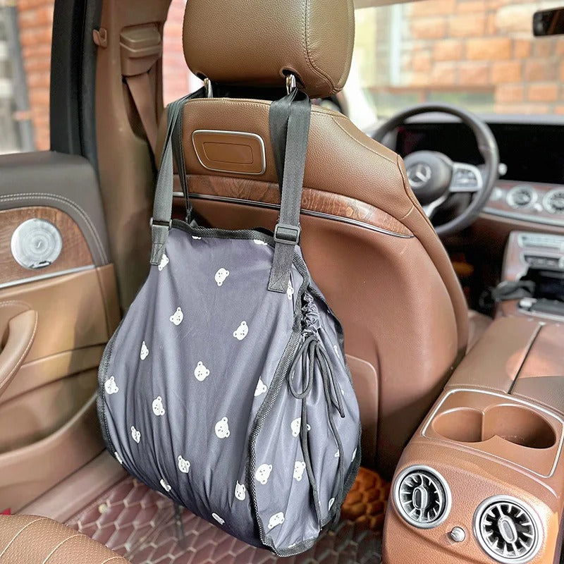 Sac de rangement suspendu pour voiture. Grand et large organiseur de voiture. TrÚs pratique pour vos déplacements. Indispensable pour les parents baroudeurs