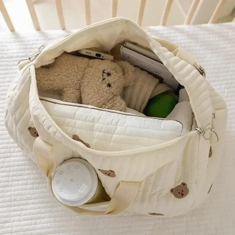 Sac de voyage pour bébé en déplacement en matiÚre gaz de coton équipé d'un grand espace de rangement