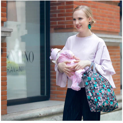 Sac à langer Mama Bag en bandoulière, pensé pour le confot des parents