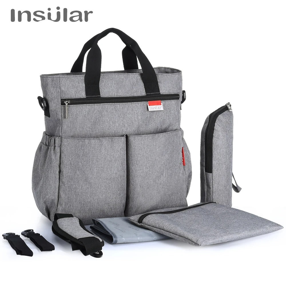 Sac Mama Bag porté en sac à dos ou bandoulière selon les besoins
