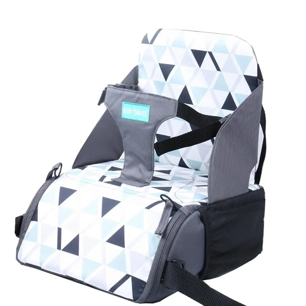 Siège de table mais aussi rehausseur de chaise pour bébé super pratique pour vos déplacements à motif triangle